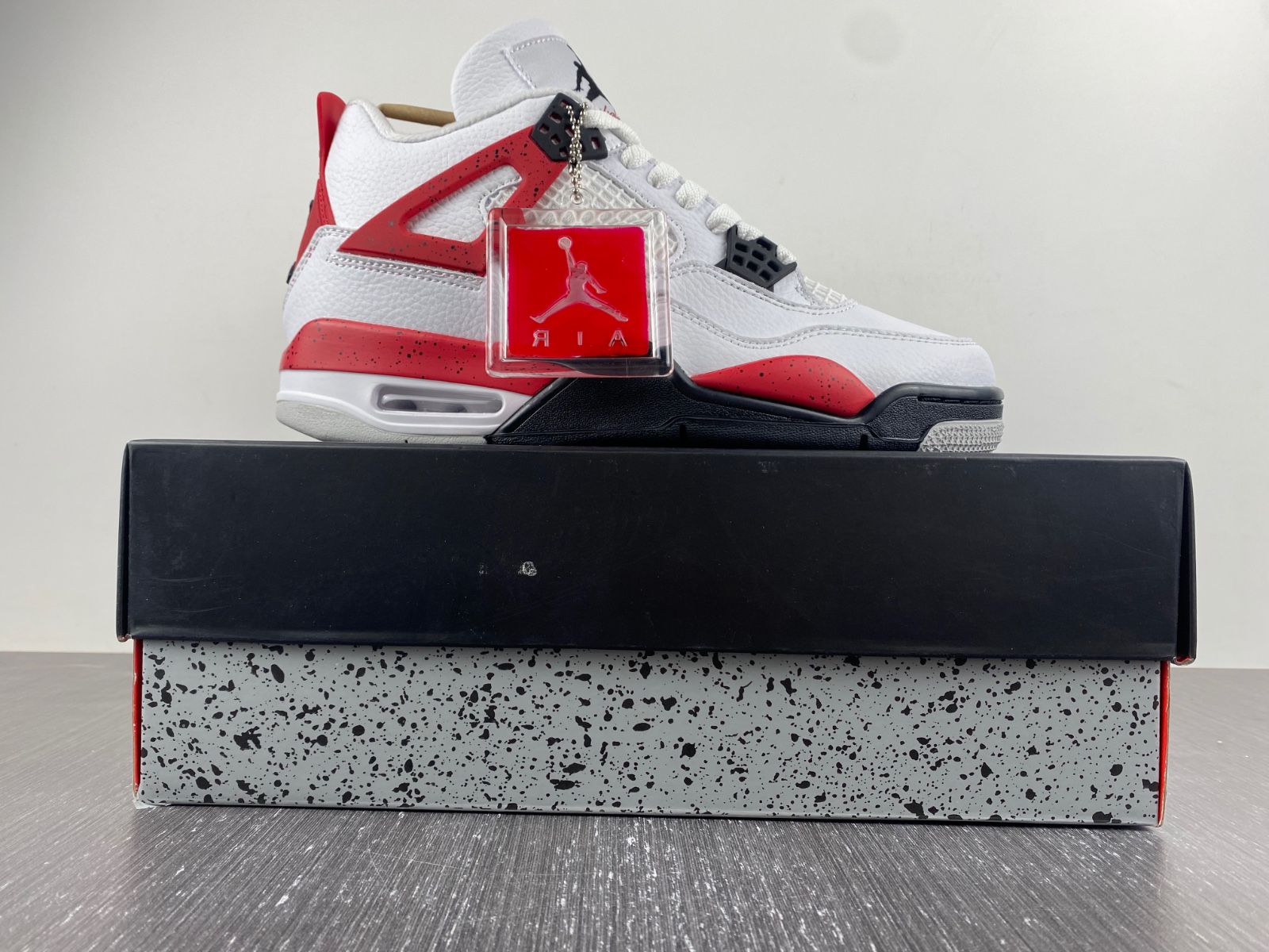 Jordan 4 Retro Red Cement