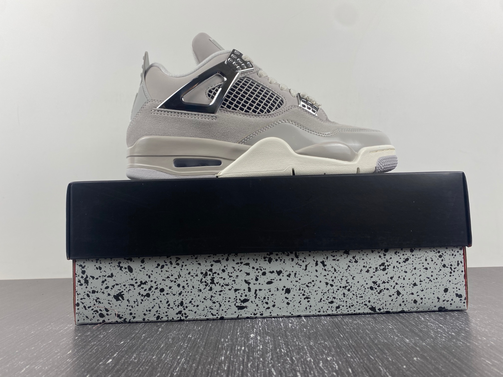 Jordan 4 Retro Frozen Moments